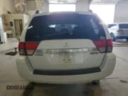 ✅ 2011 Mitsubishi Endeavor LS • VIN: 4A4JN2AS7BE019113 • Lot: 69598235. Wystawiony na Copart z przebiegiem 189 918 mil. Bezpłatny archiwum sprzedaży aukcyjnych z USA i szczegółowy raport historii pojazdu na DreamBid. Zdjęcie 6.