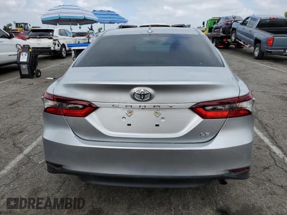 ✅ 2023 Toyota Camry LE • VIN: 4T1C11AKXPU763660 • Lot: 54922705. Wystawiony na Copart z przebiegiem 33 163 mil. Bezpłatny archiwum sprzedaży aukcyjnych z USA i szczegółowy raport historii pojazdu na DreamBid. Zdjęcie 6.
