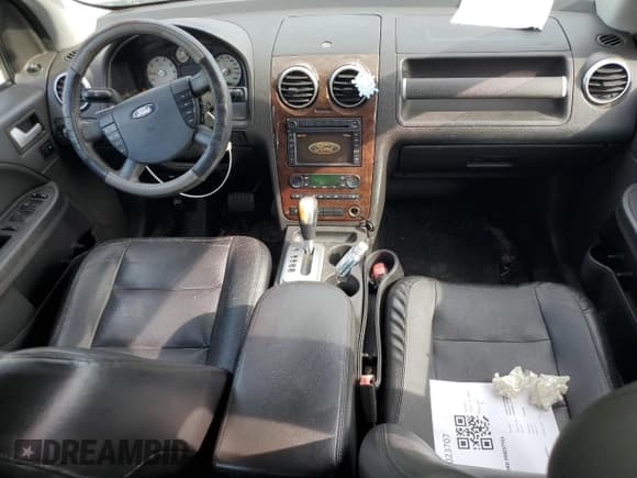 ✅ 2007 Ford Freestyle Limited • VIN: 1FMZK03177GA07904 • Lot: 68519235. Wystawiony na Copart z przebiegiem 100 552 mil. Bezpłatny archiwum sprzedaży aukcyjnych z USA i szczegółowy raport historii pojazdu na DreamBid. Zdjęcie 8.