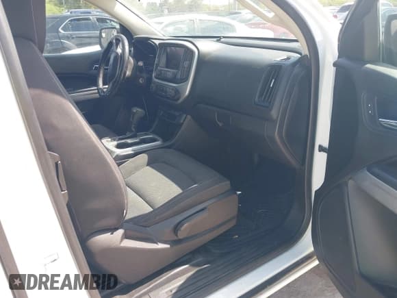 ✅ 2020 Chevrolet Colorado 4WD LT • VIN: 1GCHTCEA6L1163215 • Lot: 43206313. Listed on IAAI with 144,189 mi. Free auction sales archive from the USA and detailed vehicle history report at DreamBid. Image 5.