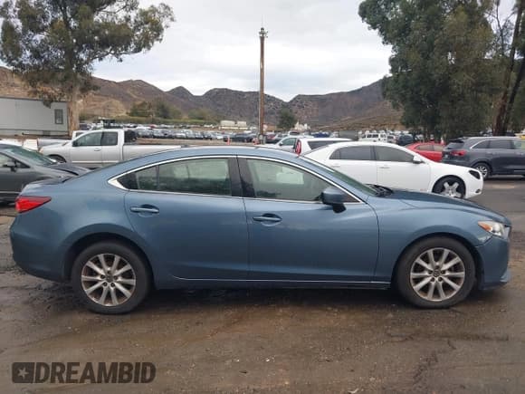 ✅ 2017 Mazda 6 Sport • VIN: JM1GL1U53H1143015 • Lot: 43768546. Listed on IAAI with 245,429 mi. Free auction sales archive from the USA and detailed vehicle history report at DreamBid. Image 13.