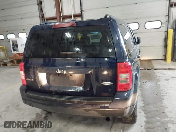 ✅ 2014 Jeep Patriot Latitude • VIN: 1C4NJRFB0ED730765 • Lot: 42309571. Listed on IAAI with 218,577 mi. Free auction sales archive from the USA and detailed vehicle history report at DreamBid. Image 16.
