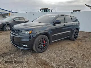 ✅ 2018 Jeep Grand Cherokee SRT • VIN: 1C4RJFDJ2JC256988 • Lot: 94047795. Wystawiony na Copart z przebiegiem 124 773 mil. Bezpłatny archiwum sprzedaży aukcyjnych z USA i szczegółowy raport historii pojazdu na DreamBid. Zdjęcie 1.