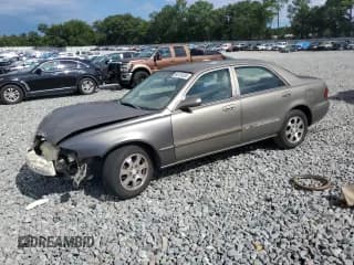 ✅ 2002 Mazda 626 LX • VIN: 1YVGF22C625301436 • Lot: 68753555. Wystawiony na Copart z przebiegiem 147 202 mil. Bezpłatny archiwum sprzedaży aukcyjnych z USA i szczegółowy raport historii pojazdu na DreamBid. Zdjęcie 1.