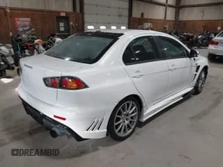 ✅ 2015 Mitsubishi Lancer Evolution GSR • VIN: JA32W8FV4FU016162 • Lot: 43647204. Wystawiony na IAAI z przebiegiem 13 780 mil. Bezpłatny archiwum sprzedaży aukcyjnych z USA i szczegółowy raport historii pojazdu na DreamBid. Zdjęcie 4.