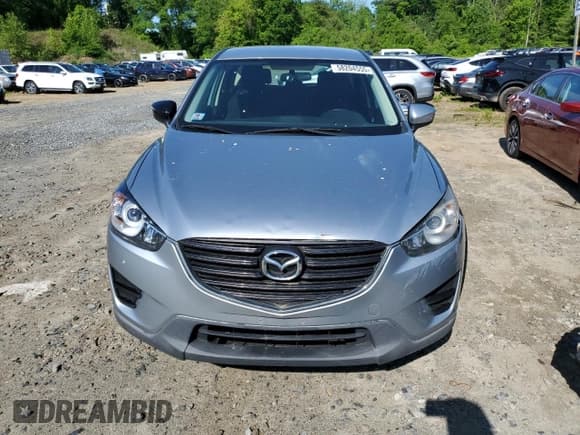 ✅ 2016 Mazda CX-5 Sport • VIN: JM3KE4BY2G0617549 • Lot: 58204555. Listed on Copart with 216,050 mi. Free auction sales archive from the USA and detailed vehicle history report at DreamBid. Image 5.