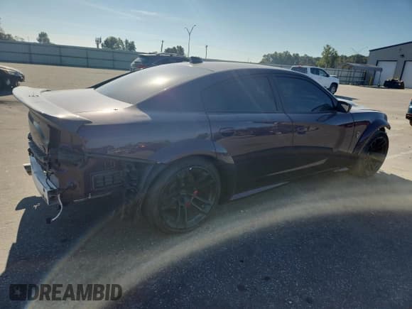✅ 2022 Dodge Charger SRT Hellcat Widebody • VIN: 2C3CDXL90NH124006 • Лот: 81262145. Опубликован ранее на Copart с пробегом 19 524 миль. Бесплатный доступ к архиву аукционных продаж из США и подробный отчёт об истории автомобиля на DreamBid. Изображение 3.