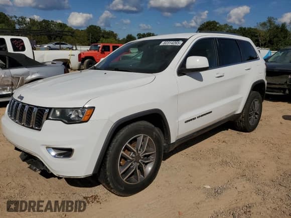 ✅ 2020 Jeep Grand Cherokee Laredo E • VIN: 1C4RJFAG0LC144119 • Lot: 82314265. Listed on Copart with 109,395 mi. Free auction sales archive from the USA and detailed vehicle history report at DreamBid. Image 1.