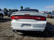 ✅ 2014 Dodge Charger SE • VIN: 2C3CDXBG1EH275193 • Lot: 80214225. Wystawiony na Copart z przebiegiem 167 071 mil. Bezpłatny archiwum sprzedaży aukcyjnych z USA i szczegółowy raport historii pojazdu na DreamBid. Zdjęcie 6.