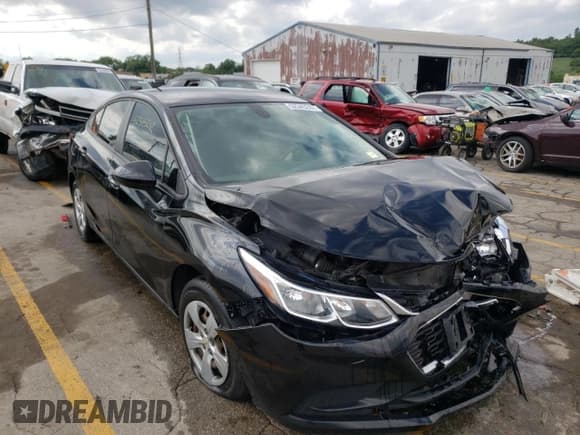 ✅ 2018 Chevrolet Cruze LS • VIN: 1G1BC5SM6J7204235 • Lot: 52345242. Listed on Copart with 92,191 mi. Free auction sales archive from the USA and detailed vehicle history report at DreamBid. Image 1.