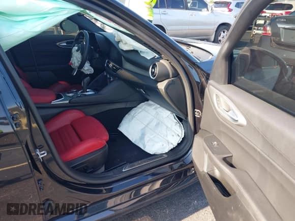 ✅ 2024 Alfa Romeo Giulia Veloce • VIN: ZARFAMBN0R7683089 • Lot: 43059158. Listed on IAAI with 27,528 mi. Free auction sales archive from the USA and detailed vehicle history report at DreamBid. Image 5.