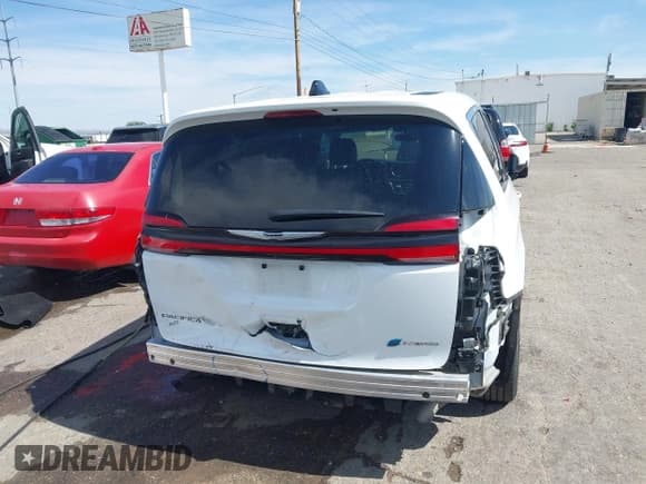 ✅ 2023 Chrysler Pacifica Hybrid Touring L • VIN: 2C4RC1L73PR611735 • Лот: 42721569. Опубликован ранее на IAAI с пробегом 54 462 миль. Бесплатный доступ к архиву аукционных продаж из США и подробный отчёт об истории автомобиля на DreamBid. Изображение 17.