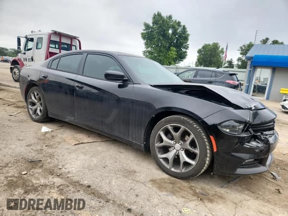 ✅ 2015 Dodge Charger SXT • VIN: 2C3CDXHG9FH915031 • Lot: 60565025. Listed on Copart with 187,236 mi. Free auction sales archive from the USA and detailed vehicle history report at DreamBid. Image 4.