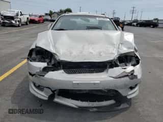 2006 Hyundai Tiburon GS с VIN KMHHM65D86U212227, выставлен на аукционе Copart как лот 59633855 с пробегом Не указан миль и Списание • Salvage title. История ставок и продаж доступна на DreamBid. Изображение 5.