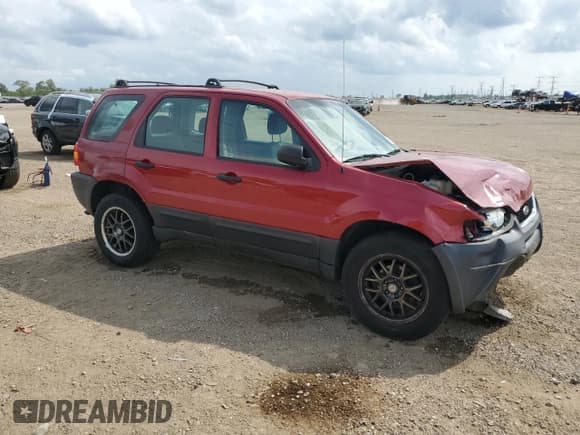 ✅ 2003 Ford Escape XLS Popular • VIN: 1FMYU92103KA03048 • Lot: 68683685. Listed on Copart with 100,475 mi. Free auction sales archive from the USA and detailed vehicle history report at DreamBid. Image 4.