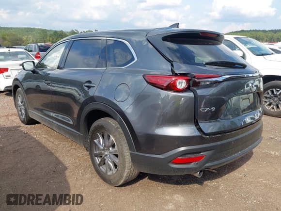 ✅ 2021 Mazda CX-9 Touring • VIN: JM3TCACY7M0526506 • Lot: 43277754. Listed on IAAI with 36,200 mi. Free auction sales archive from the USA and detailed vehicle history report at DreamBid. Image 3.
