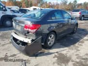 ✅ 2014 Chevrolet Cruze 1LT • VIN: 1G1PC5SB3E7349727 • Lot: 43571475. Listed on IAAI with 121,700 mi. Free auction sales archive from the USA and detailed vehicle history report at DreamBid. Image 4.