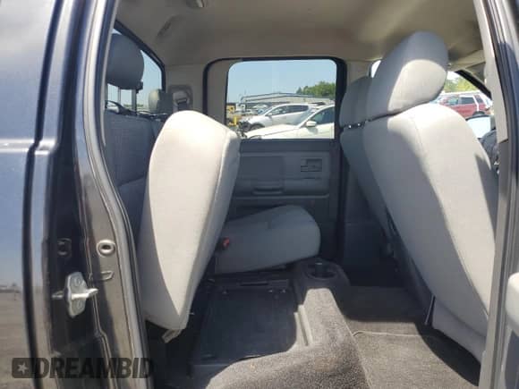 2008 Dodge Dakota SLT с VIN 1D7HE48K68S505807, выставлен на аукционе Copart как лот 59005765 с пробегом 195 763 миль миль и Списание • Salvage title. История ставок и продаж доступна на DreamBid. Изображение 10.