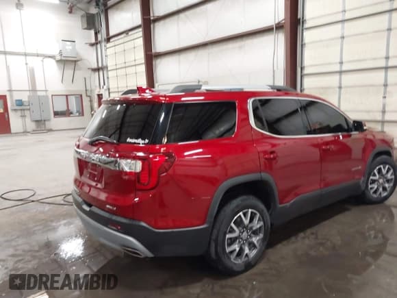 ✅ 2023 GMC Acadia SLE • VIN: 1GKKNRL42PZ134581 • Lot: 42043653. Listed on IAAI with 41,292 mi. Free auction sales archive from the USA and detailed vehicle history report at DreamBid. Image 4.