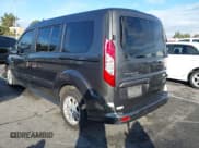 ✅ 2021 Ford Transit Connect XLT • VIN: NM0GS9F26M1487725 • Lot: 43704125. Listed on IAAI with 59,567 mi. Free auction sales archive from the USA and detailed vehicle history report at DreamBid. Image 3.