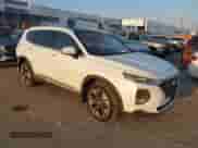 2020 Hyundai Santa Fe SEL z VIN 5NMS3CAAXLH216029, wystawiony jako IAAI lot #43222450 z przebiegiem 70 337 mil mil oraz . Historia ofert i sprzedaży dostępna na DreamBid. Obrazek 1.