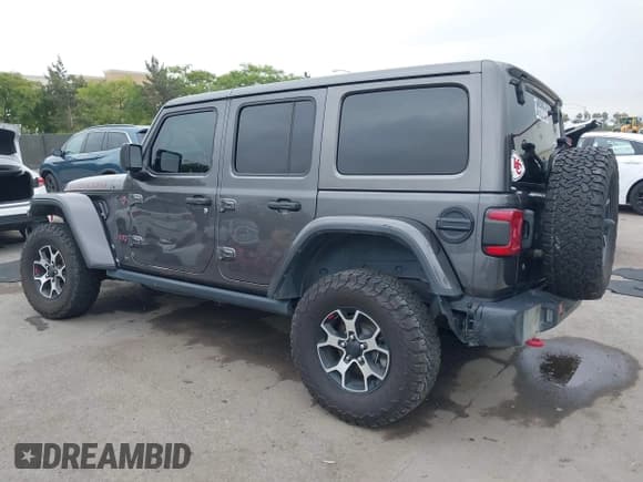 ✅ 2020 Jeep Wrangler Unlimited Rubicon • VIN: 1C4HJXFG1LW233075 • Lot: 42328486. Listed on IAAI with 85,359 mi. Free auction sales archive from the USA and detailed vehicle history report at DreamBid. Image 3.