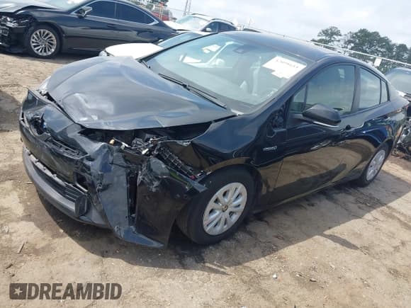 ✅ 2022 Toyota Prius L Eco • VIN: JTDKAMFU8N3181135 • Lot: 42098611. Listed on IAAI with 69,949 mi. Free auction sales archive from the USA and detailed vehicle history report at DreamBid. Image 17.