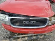 ✅ 2000 GMC Sierra 1500 SLE • VIN: 1GTEK14T7YZ156313 • Лот: 44302425. Опубликован ранее на Copart с пробегом 177 719 миль. Бесплатный доступ к архиву аукционных продаж из США и подробный отчёт об истории автомобиля на DreamBid. Изображение 12.