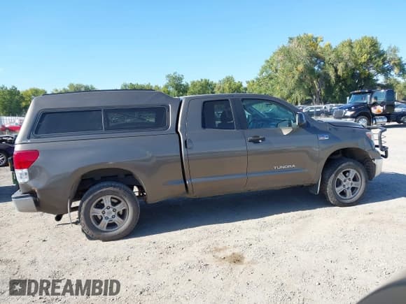✅ 2011 Toyota Tundra • VIN: 5TFUY5F12BX170894 • Lot: 43302330. Listed on IAAI with 167,830 mi. Free auction sales archive from the USA and detailed vehicle history report at DreamBid. Image 14.