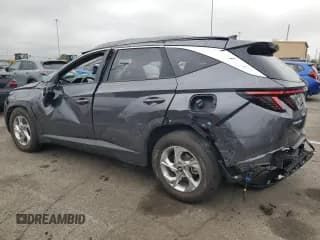 ✅ 2023 Hyundai Tucson SEL • VIN: KM8JB3AE3PU185279 • Lot: 69823873. Wystawiony na Copart z przebiegiem 11 959 mil. Bezpłatny archiwum sprzedaży aukcyjnych z USA i szczegółowy raport historii pojazdu na DreamBid. Zdjęcie 2.