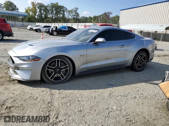 ✅ 2021 Ford Mustang GT • VIN: 1FA6P8CF4M5138322 • Lot: 80683095. Listed on Copart with 32,063 mi. Free auction sales archive from the USA and detailed vehicle history report at DreamBid. Image 1.