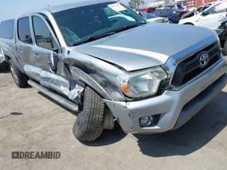✅ 2015 Toyota Tacoma PreRunner • VIN: 3TMKU4HN9FM045948 • Lot: 42575327. Listed on IAAI with 67,971 mi. Free auction sales archive from the USA and detailed vehicle history report at DreamBid. Image 1.