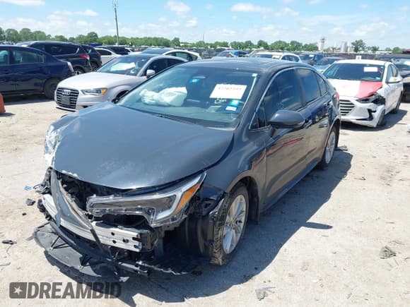 ✅ 2023 Toyota Corolla Hybrid LE • VIN: JTDBCMFE4P3003311 • Лот: 42202393. Опубликован ранее на IAAI с пробегом 27 961 миль. Бесплатный доступ к архиву аукционных продаж из США и подробный отчёт об истории автомобиля на DreamBid. Изображение 2.