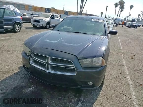 ✅ 2011 Dodge Charger Rallye • VIN: 2B3CL3CG7BH553520 • Лот: 67990965. Опубликован ранее на Copart с пробегом 252 266 миль. Бесплатный доступ к архиву аукционных продаж из США и подробный отчёт об истории автомобиля на DreamBid. Изображение 13.