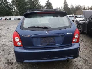 ✅ 2003 Mazda Protege • VIN: JM1BJ246831154986 • Lot: 86130544. Wystawiony na Copart z przebiegiem 277 837 mil. Bezpłatny archiwum sprzedaży aukcyjnych z USA i szczegółowy raport historii pojazdu na DreamBid. Zdjęcie 6.