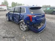 ✅ 2023 Cadillac XT6 AWD Premium Luxury • VIN: 1GYKPFRS1PZ180407 • Lot: 42250662. Listed on IAAI with 21,465 mi. Free auction sales archive from the USA and detailed vehicle history report at DreamBid. Image 3.