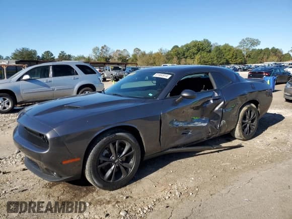 ✅ 2022 Dodge Challenger SXT • VIN: 2C3CDZGG1NH142907 • Lot: 81664914. Wystawiony na Copart z przebiegiem 24 230 mil. Bezpłatny archiwum sprzedaży aukcyjnych z USA i szczegółowy raport historii pojazdu na DreamBid. Zdjęcie 1.
