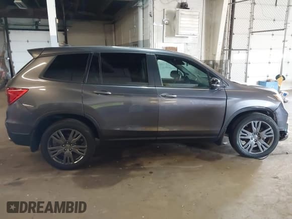 ✅ 2021 Honda Passport EX-L • VIN: 5FNYF8H56MB012533 • Lot: 42561010. Listed on IAAI with 40,568 mi. Free auction sales archive from the USA and detailed vehicle history report at DreamBid. Image 14.