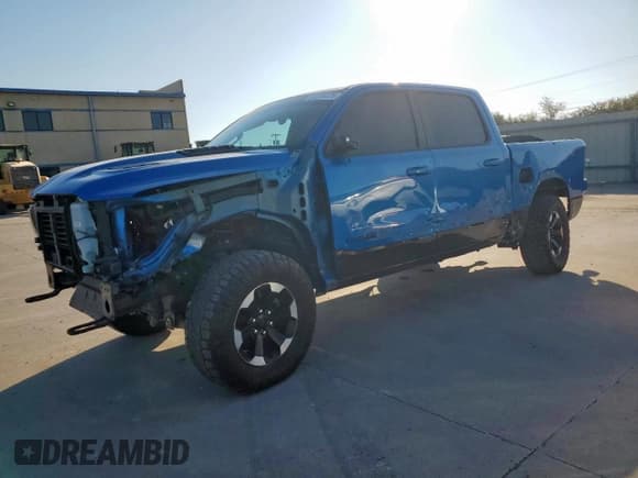 ✅ 2021 Ram 1500 Rebel • VIN: 1C6SRFLT0MN513398 • Lot: 82254125. Listed on Copart with 98,044 mi. Free auction sales archive from the USA and detailed vehicle history report at DreamBid. Image 1.