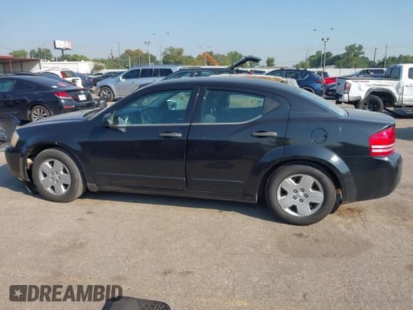 ✅ 2010 Dodge Avenger SXT • VIN: 1B3CC4FB8AN200733 • Lot: 43329062. Listed on IAAI with 151,484 mi. Free auction sales archive from the USA and detailed vehicle history report at DreamBid. Image 14.