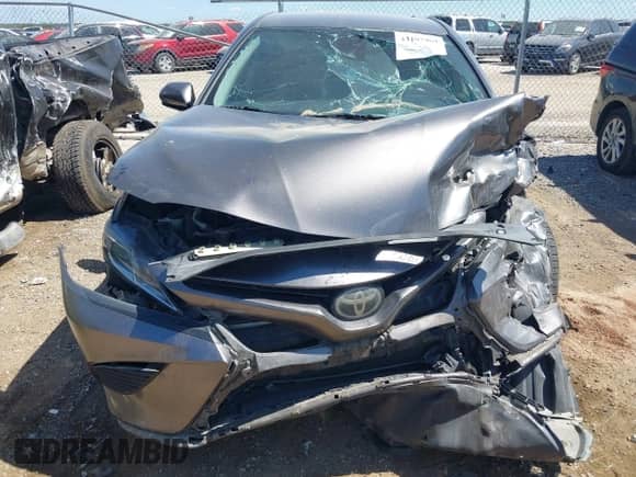 2019 Toyota Camry LE with VIN 4T1B11HK6KU729824, listed as a IAAI auction lot 43107969 with 157,176 mi miles and . Bid and sale history available at DreamBid. Image 13.