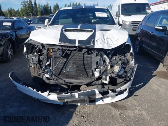 2018 Dodge Durango SRT with VIN 1C4SDJGJ3JC395759, listed as a IAAI auction lot 41689356 with 83,577 mi miles and . Bid and sale history available at DreamBid. Image 6.