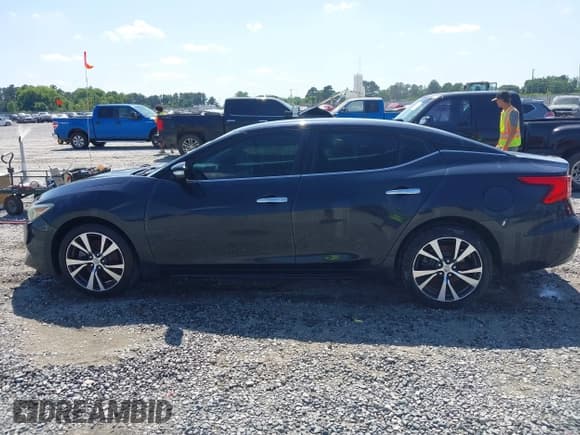 ✅ 2016 Nissan Maxima SL • VIN: 1N4AA6AP4GC426997 • Lot: 42324146. Wystawiony na IAAI z przebiegiem 209 127 mil. Bezpłatny archiwum sprzedaży aukcyjnych z USA i szczegółowy raport historii pojazdu na DreamBid. Zdjęcie 14.