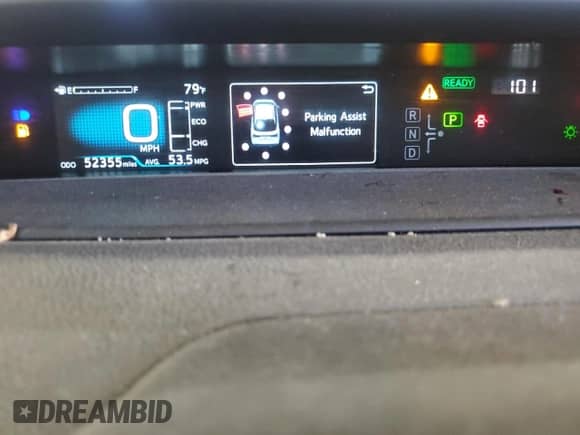 2021 Toyota Prius L Eco с VIN JTDKAMFU5M3143781, выставлен на аукционе Copart как лот 81028565 с пробегом 52 355 миль миль и Списание • Salvage title. История ставок и продаж доступна на DreamBid. Изображение 9.