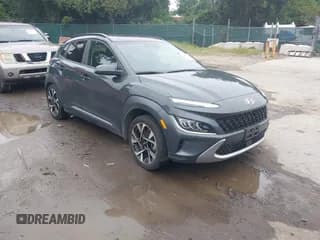 ✅ 2022 Hyundai Kona Limited • VIN: KM8K5CA37NU838543 • Лот: 43043862. Опубликован ранее на IAAI с пробегом 24 021 миль. Бесплатный доступ к архиву аукционных продаж из США и подробный отчёт об истории автомобиля на DreamBid. Изображение 1.