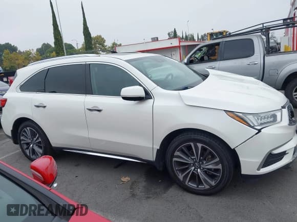 ✅ 2019 Acura MDX Technology • VIN: 5J8YD4H5XKL025330 • Lot: 42995715. Wystawiony na IAAI z przebiegiem 77 793 mil. Bezpłatny archiwum sprzedaży aukcyjnych z USA i szczegółowy raport historii pojazdu na DreamBid. Zdjęcie 13.