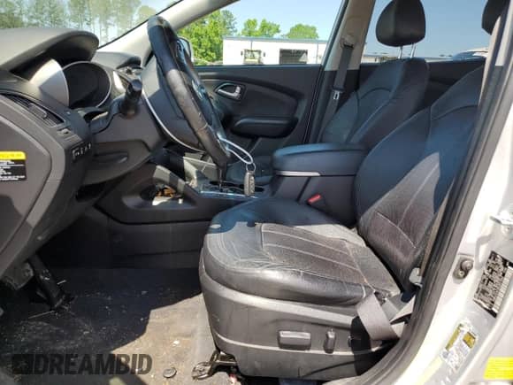 2013 Hyundai Tucson Limited z VIN KM8JUCAC9DU557664, wystawiony jako Copart lot #53707934 z przebiegiem 148 967 mil mil oraz Szkoda całkowita • Salvage title. Historia ofert i sprzedaży dostępna na DreamBid. Obrazek 7.