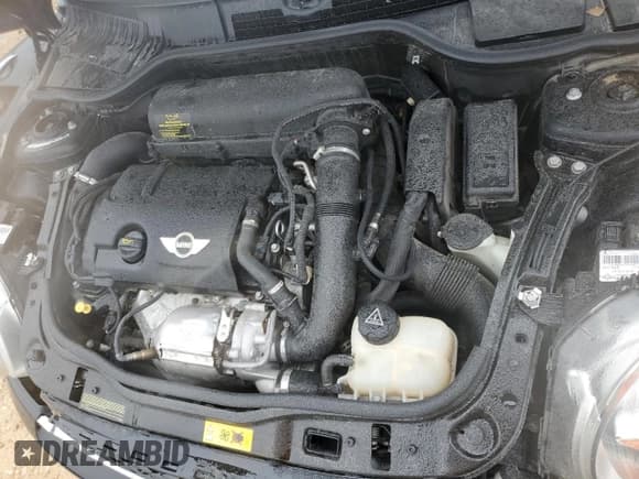 ✅ 2013 MINI Coupe S • VIN: WMWSX3C52DT466544 • Лот: 84965904. Опубликован ранее на Copart с пробегом Не указан. Бесплатный доступ к архиву аукционных продаж из США и подробный отчёт об истории автомобиля на DreamBid. Изображение 11.