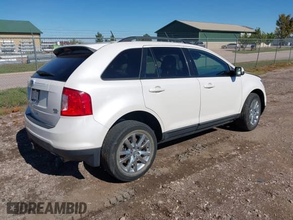 ✅ 2014 Ford Edge SEL • VIN: 2FMDK4JC7EBA30156 • Lot: 43385786. Listed on IAAI with 135,813 mi. Free auction sales archive from the USA and detailed vehicle history report at DreamBid. Image 4.