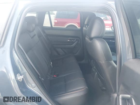 ✅ 2023 Mazda CX-50 S Premium Plus • VIN: 7MMVABEM0PN106956 • Лот: 43082881. Опубликован ранее на IAAI с пробегом 19 807 миль. Бесплатный доступ к архиву аукционных продаж из США и подробный отчёт об истории автомобиля на DreamBid. Изображение 8.